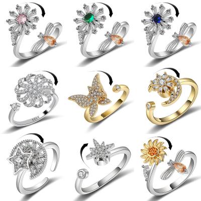 China INS CLASSIC Rotary Ring Decompression Female Opening Ins Wrap Zircon Snow Ring Christmas Jewelry European Female for sale