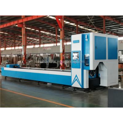 China SERVOMOTOR 7% price off raycus ipg low price aluminum pipe laser cutting machine laser cutter / low cost steel pipe for sale