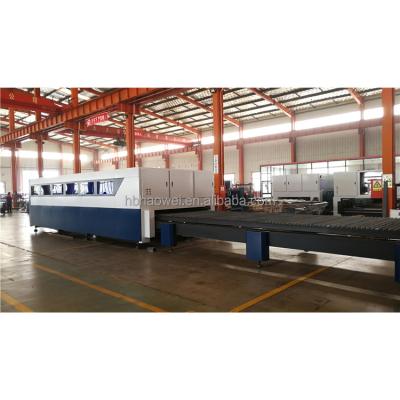 China SERVOMOTOR exchange table bed fiber laser cutting machine bigger fully cover laser cutting machine high power high efficient cutter for sale