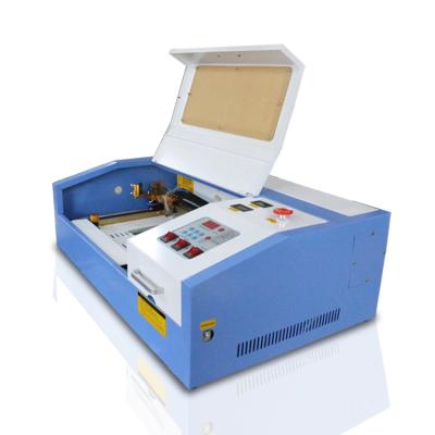 China 3020 Laser Engraving Machine Wallet Small Portable Laser Engraving Machine Water Cooled for sale