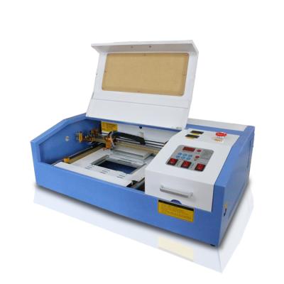 China Laser Engraving Mini And Desktop Acrylic / Organic Glass Laser Cutting / Stamp Making Machine FL-K40 for sale