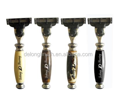 China Triple Blade Resin Handle 3 Blade Razor for sale