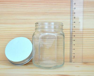 China Stocked 190ml High Quality Transparent Glass Honey Bottle With Aluminum Cap for sale