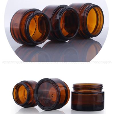 China Personal Care Clear 30ml Glass Cosmetic Jar With Black Lid for sale