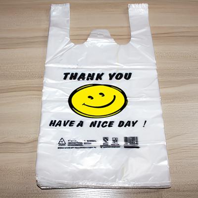 China Grocery Store BOPP Microwavable Custom Printing Vest Handle T-shirt Microwavable Plastic Shopping Carrier Bag On Roll for sale