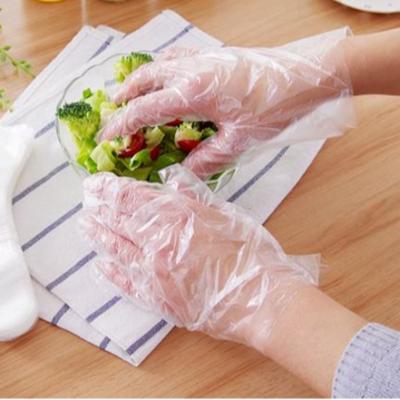 China Industrial Protective Gloves 0.6g PE Material And Poly Use Disposable Food Cleaning Gloves , One Time Use Household Gloves for sale