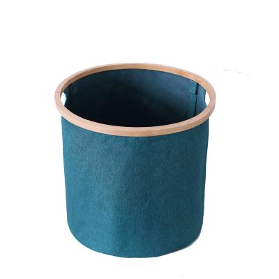 China Amazon Storage Folding Sustainable Canvas Fabric Barrel Baskets With Bamboo Support Rods For Organization for sale