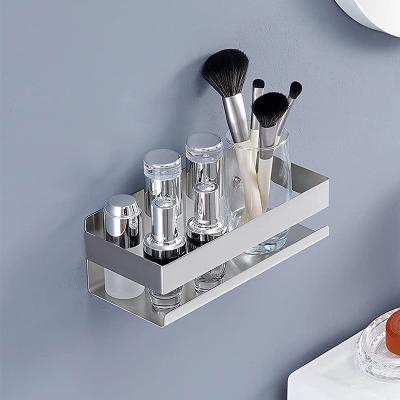 China Wall Mounted Type Fashion Smart Mold Silver No Drill Stainless Steel Shower Storage Bathroom Shelf Shower Caddy For Bathroom Storage for sale