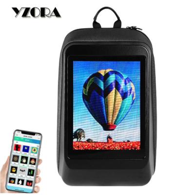 China LED display screen yzora stock 128x96 programmable full color app control diy led billboard display screen smart travel backpack bag for sale