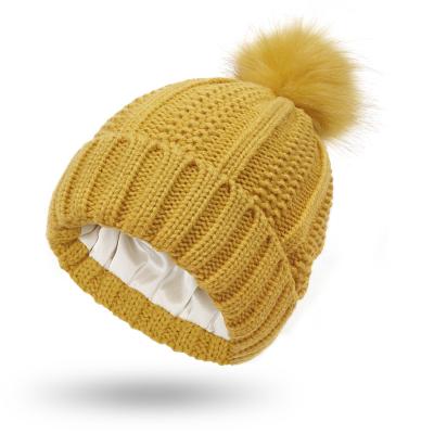 China COMMON High Quality Custom Women Winter Hats Ribbed Pom Pom Satin Lined Knitted Beanie Hats for sale