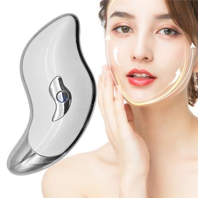 China Vibrating Ultrasonic Facial Massager Roller Scraping Face Massager Electric Sha Face Lift Gua Sha Massager for sale