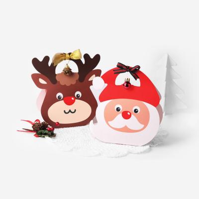 China DF Custom Recyclable Red Brown Color Cute Santa Claus Merry Christmas Eve Cartoon Deer Candy Handbag Cardboard Packaging Gift Paper Box for sale