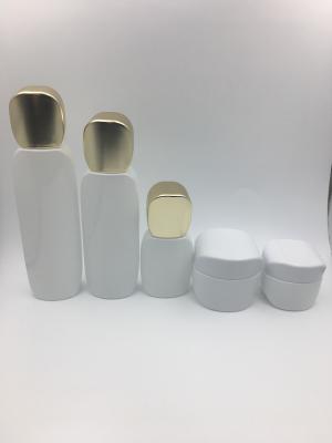 China Various Painting Glass Cosmetic Packaging In Set White Bottle Gold Cap for sale