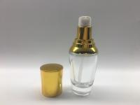 China Forma oval de empaquetado cosmética de la botella de cristal de la bomba 30ml para la loción/el suero en venta