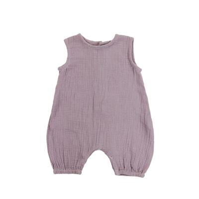 China Super Soft Organic Muslin Cotton Spring Cotton Sleeveless Boutique Buttons Design Babies Romper for sale