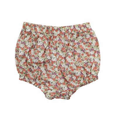 China Sustainable Wholesale Baby Kids Summer Organic Floral Woven Newborn Baby Clothes Shorts Bloomer for sale