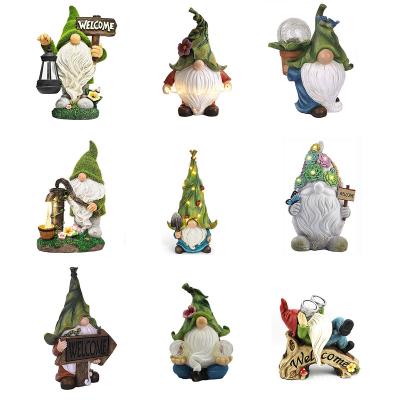 China Modern Solar Powered Gnome Light Decoration Garden Statue Elf Gifts Outdoor Christmas Garden Ornaments for sale