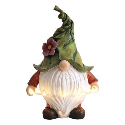 China Modern Solar Powered Gnome Light Decoration Garden Statue Elf Gifts Outdoor Christmas Garden Ornaments for sale