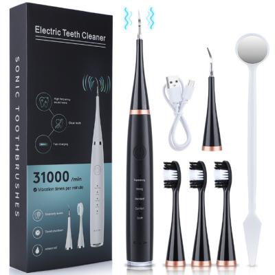 China Teeth Whitening Electric Toothbrush 4 Heads High Frequency Electric Ultrasonic Adult Plaque Remover Electric Tooth Cleaning Remover for sale