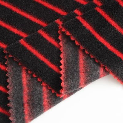 China Brushed Sueded Jihua 100% Polyester One Side Brushed Fleece Fleece Fabric Stripe Pattern for sale