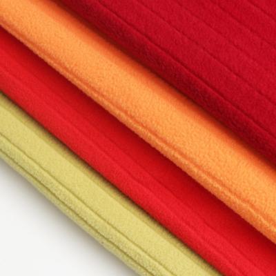 China Sueded Factory Direct Soft Brushed Polyester Jacquard Fleece Fabric For Garment Jacket for sale