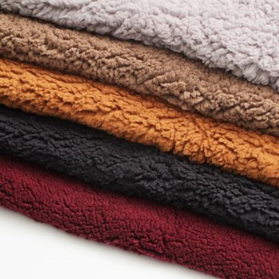 China Brushed Sueded Manufacturer Wholesale Polyester Knitted Sherpa Fleece Cotton Velvet Fabric For Sleepwear Toy for sale