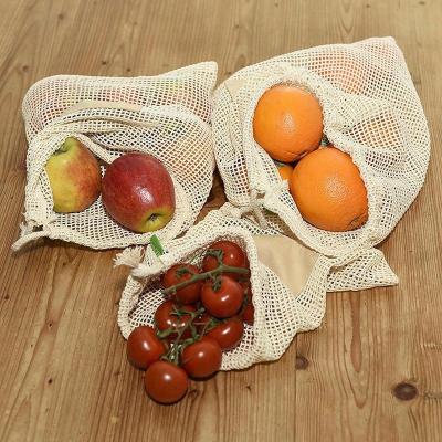 China Can add pricetag to feature Drawstring Shopping Mesh Bag Reusable Cotton Foldable Portable Fruit and Vegetable Storage Bags for sale