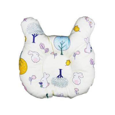 China Children Anti-static Baby Head Positioner Head Pillow Caring Flat Head Shaping Newborn Crib Wedge Baby Pillow for sale