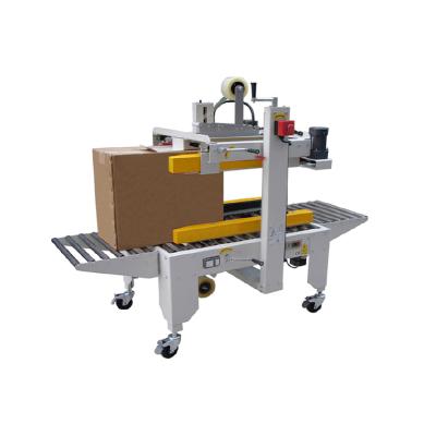 China FXJ-4060 CLOTHING Box Taping Machine Automatic Carton Sealers For High Cartons for sale