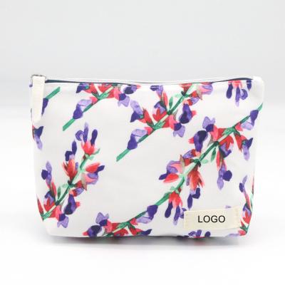 China Normcore / 2022 Springs White Ground Floral Printing Polyester Beauty Recycled rPET Fabric Minimalist Hot Cosmetic Snow Pouch Bag for sale