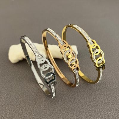 China FASHIONABLE Hot Selling Circle Art Bangles Jewelry Gold 316L Stainless Steel Sexy Gemstone Bracelets For Women for sale