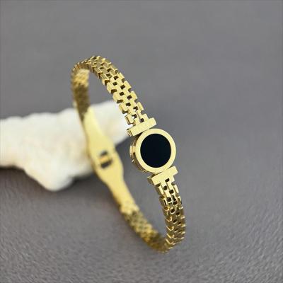 China Classic Vintage Roman Digital Hollow Bracelet Men Women Love Stainless Steel Gold Plated Bracelet for sale