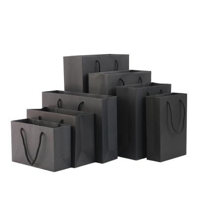 China Recycled Materials Black Kraft Paper Bag With Handle Custom Kraft Paper Bags Wholesale for sale