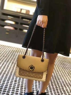 China discount  Coach style rivet parker, tea-colored antique logo and two snake skin, low-key feminine taste, suitable for al for sale