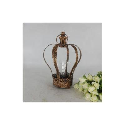 China Luxury Wrought Iron Metal Crown Candle Holder Wedding Glass Candlestick Decoration Candle Holder for sale