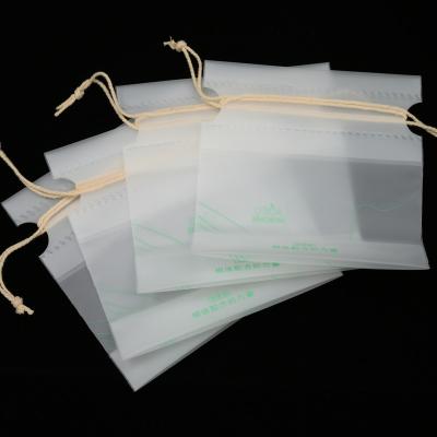 China Custom Recyclable Logo Printed Drawstring Pouches Wholesale White Gift Jewelry Cosmetic Packaging Bags for sale