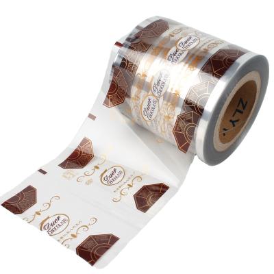 China Custom Printed Plastic Moisture Proof Lamination Lollipop Candy Food Wrapping Film Rolls for sale