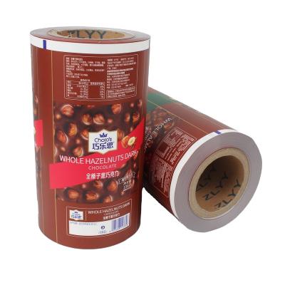 China Food Grade Moisture Proof Wholesale Candy , Chocolate , Lollipop Plastic Packaging Roll Film for sale