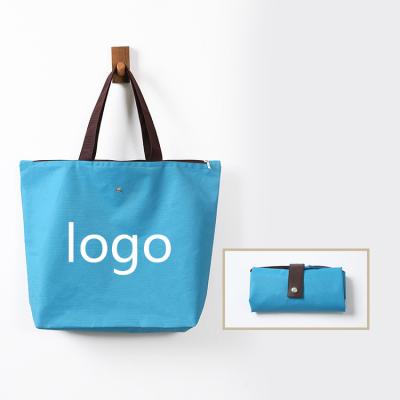 China Customized Waterproof Folding Shopping Bag 600 D Large Capacity Folding Logo Polyester Tote Polyester Grocery Bag for sale