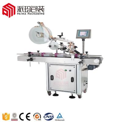 China Automatic Flat Surface 1800bph Food Label Applicator Horizontal Top Bottle Labeling Machine for sale