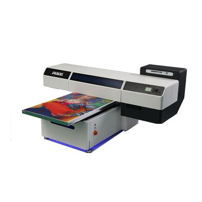 China Hotels Small Format 6090 UV Printer Led Universal UV Flatbed Printer For Mobile Phone/Bottle Case/Tile/Glass Printing for sale