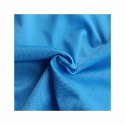 China Durable Waterproof Using Low Price Tricot Fabric Aramid Polyester Knit Fabrics Swimwear for sale