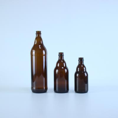 China Personal Care Best Selling Amber Transparent Empty Glass Beer Bottle for sale