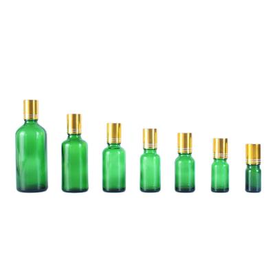 China Luxury Essential Oil Bottle Green Personal Care Essential Oil Bottle Custom Essential Oil Bottles for sale