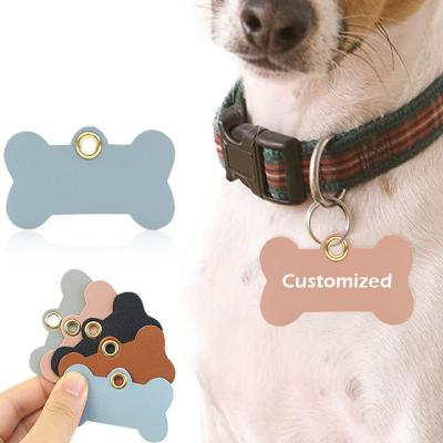 China Sustainable Custom Logo Dog Tag Pu Leather Pet ID Name Tag Pets Dog Blank Bone Suppliers Engraved Dog Tag for sale