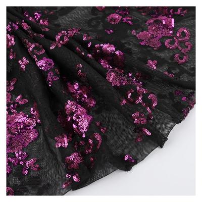 China New Sustainable Flower Embroidery Lace Sequin Fuchsia Wedding Fabric for sale