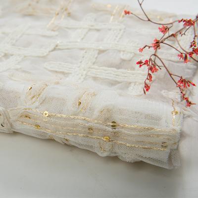 China Viable high quality swiss fancy embroidery grid lace flower net embroidery fabric for dress for sale