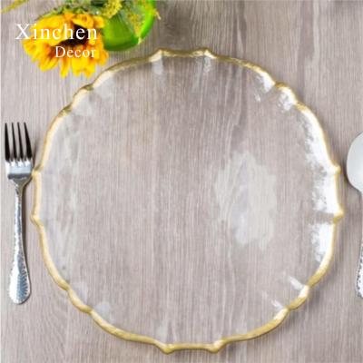 China Viable Hot Selling Gold Irregular Border Rounded Glass Charger Dishes For Wedding Events Decoration for sale