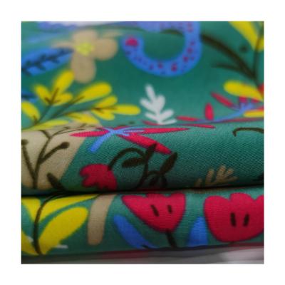 China Green Plant Anti-static High Quality Pattern Soft Silk Satin 100% Polyester Satin Fabric For Lady's Dress Underwear for sale