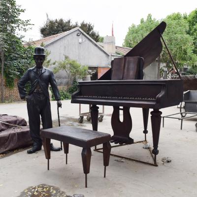 China Antique Outdoor Craft Statue Chaplin Metal Piano Bronze Sculpture Decoration for sale